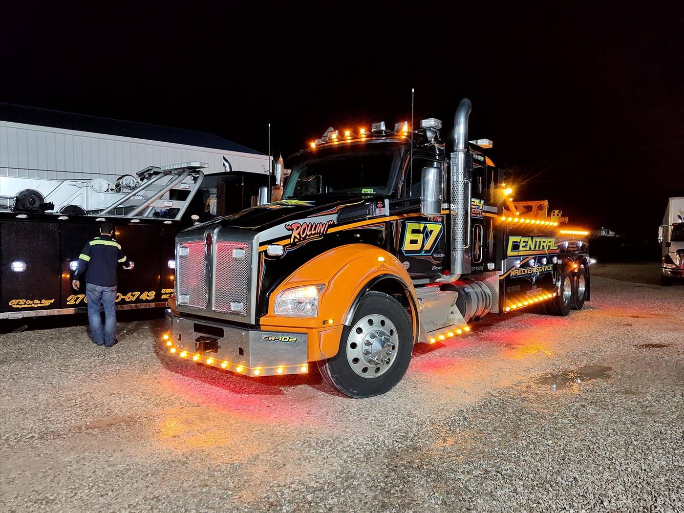 orange and black tow truck for heavy hauling