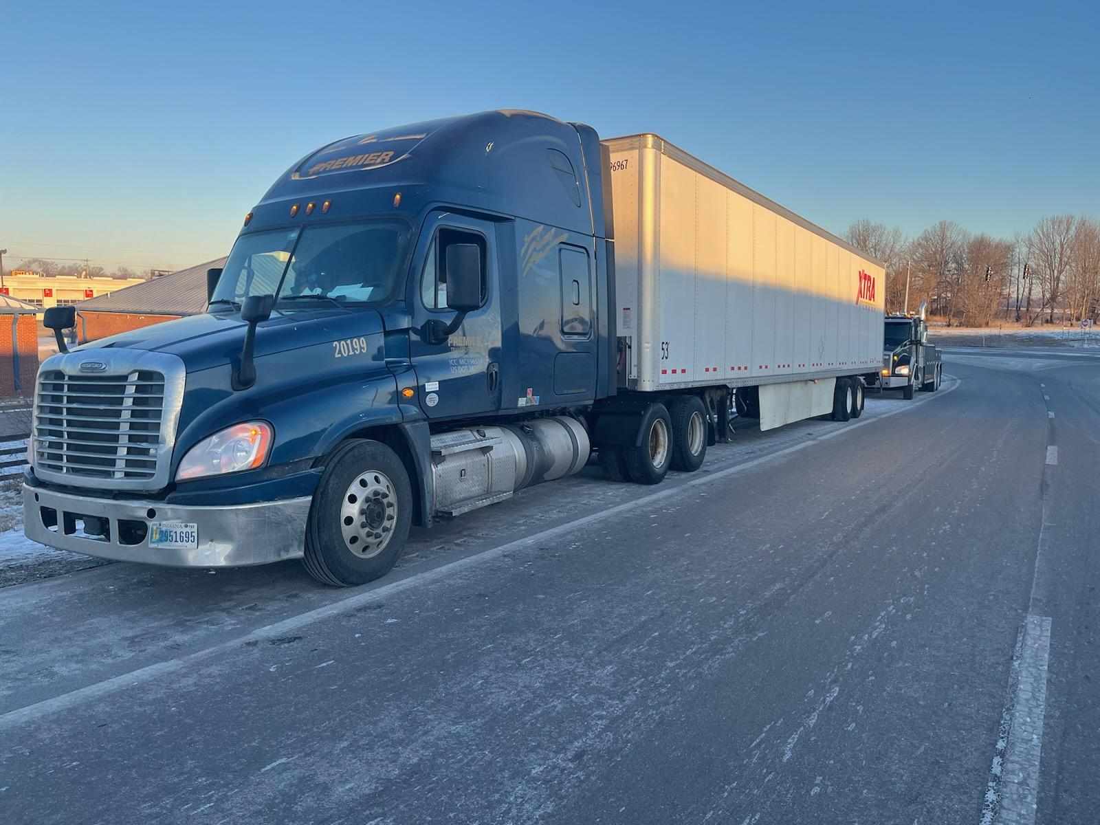 tow truck stuck on icy road