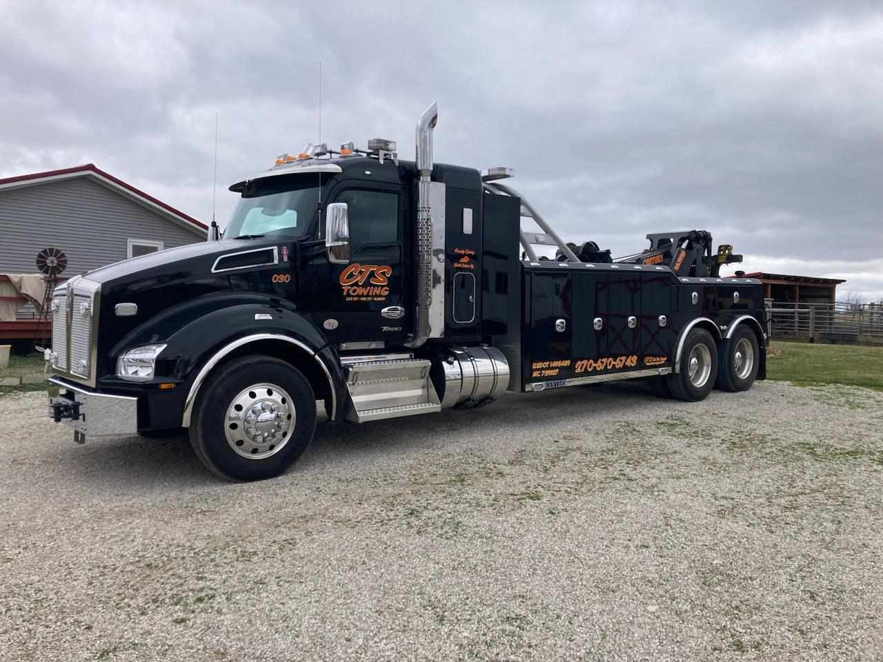 black heavy towing truck